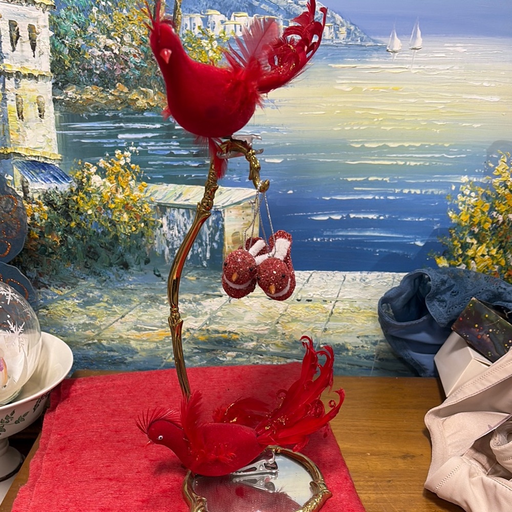 vintage-style red flocked bird ornament, mid-century modern era.